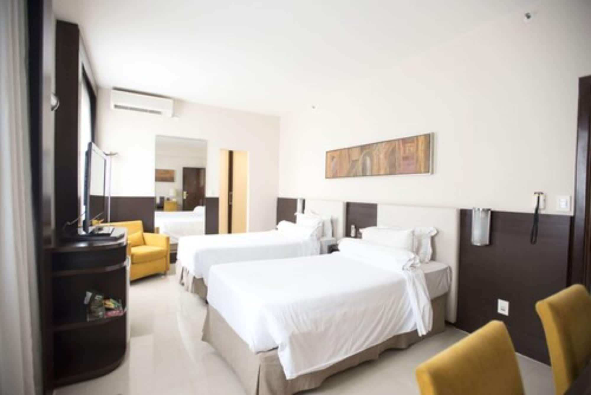 Royal Boutique Savassi Hotel Belo Horizonte Bagian luar foto A room at the hotel