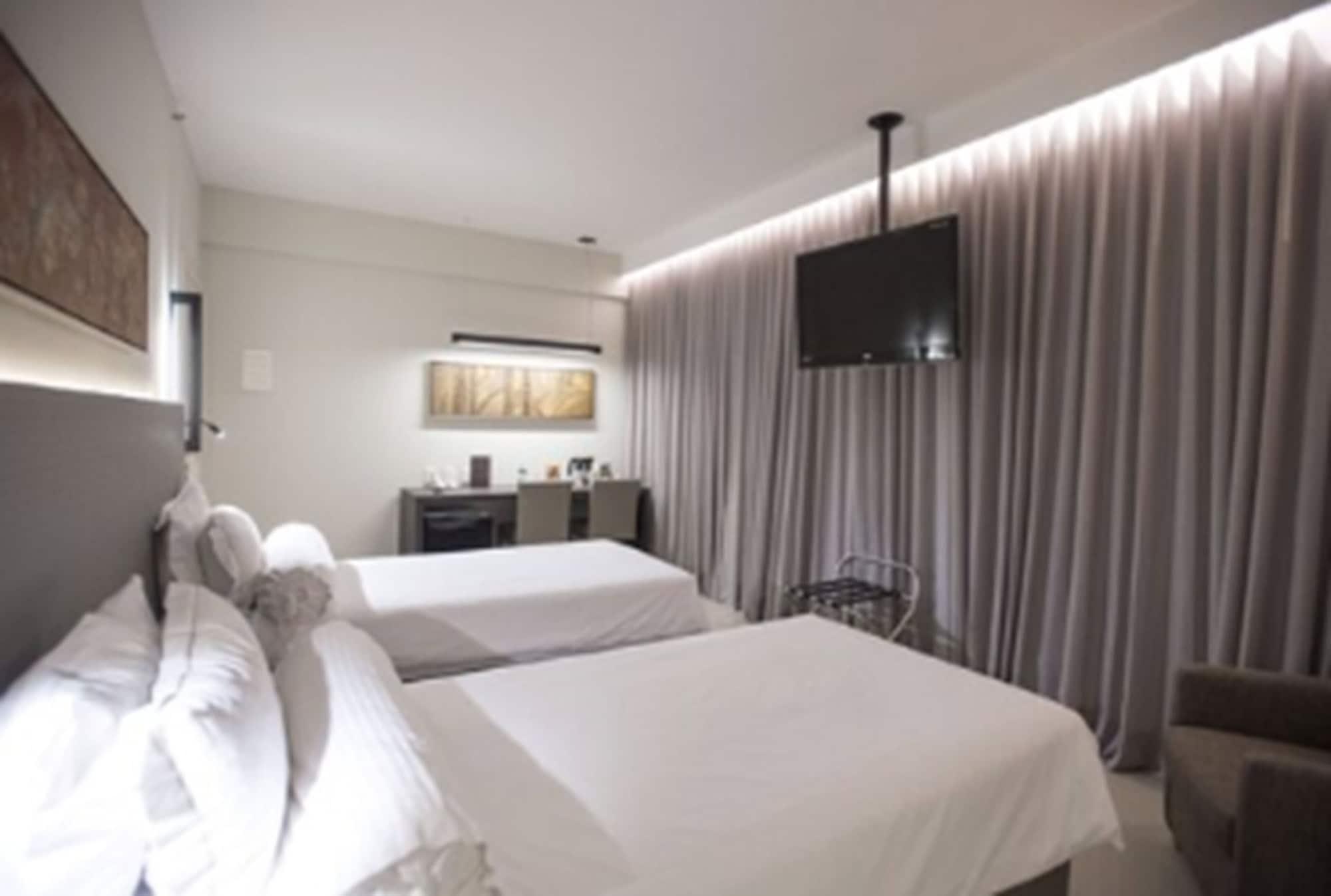 Royal Boutique Savassi Hotel Belo Horizonte Bagian luar foto A room at the hotel