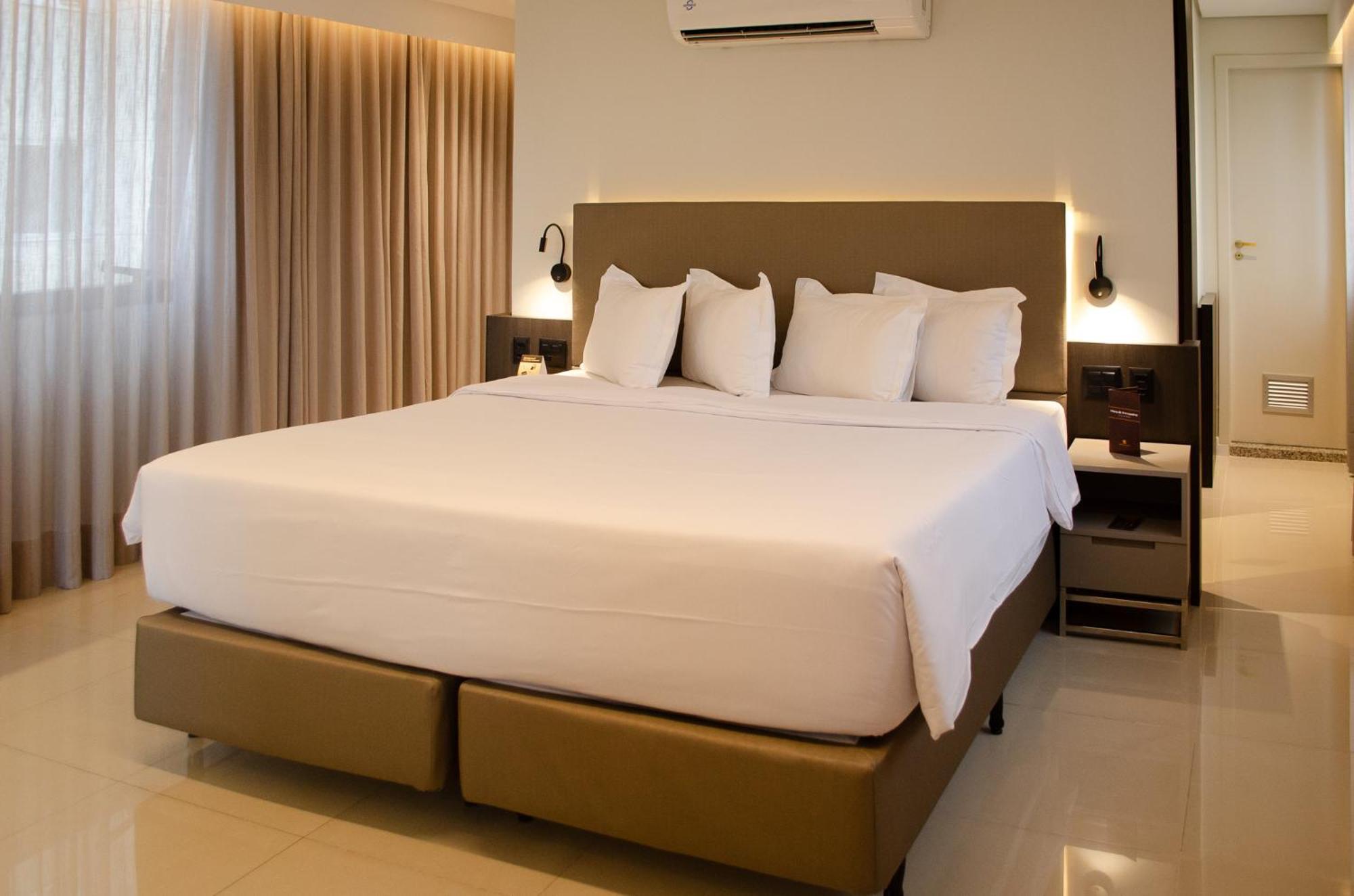 Royal Boutique Savassi Hotel Belo Horizonte Bagian luar foto A king bed