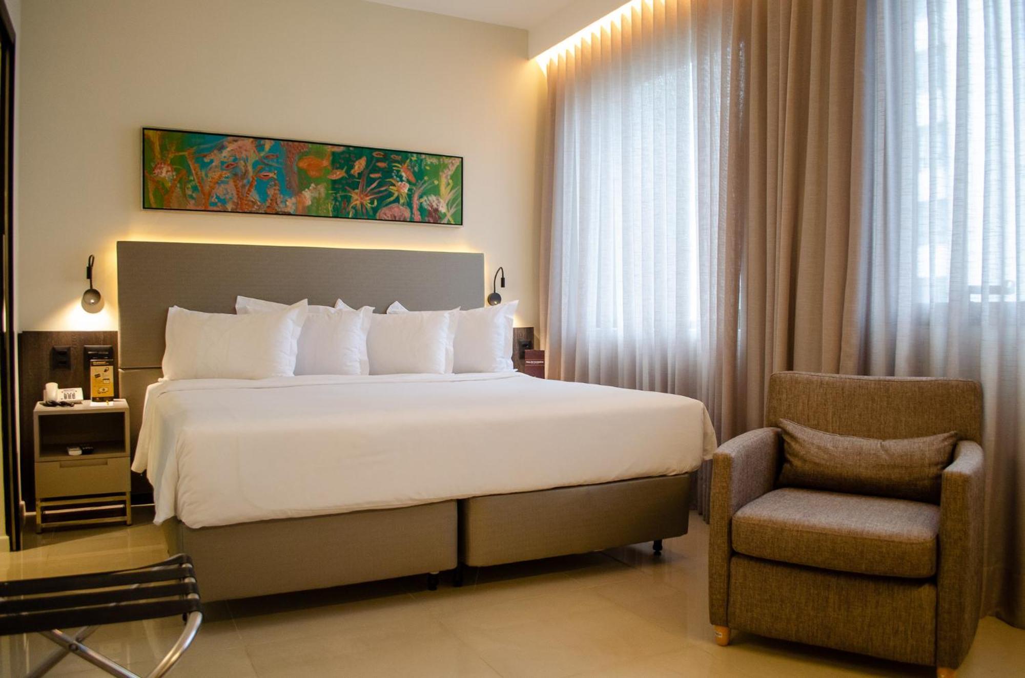 Royal Boutique Savassi Hotel Belo Horizonte Bagian luar foto A room at the hotel