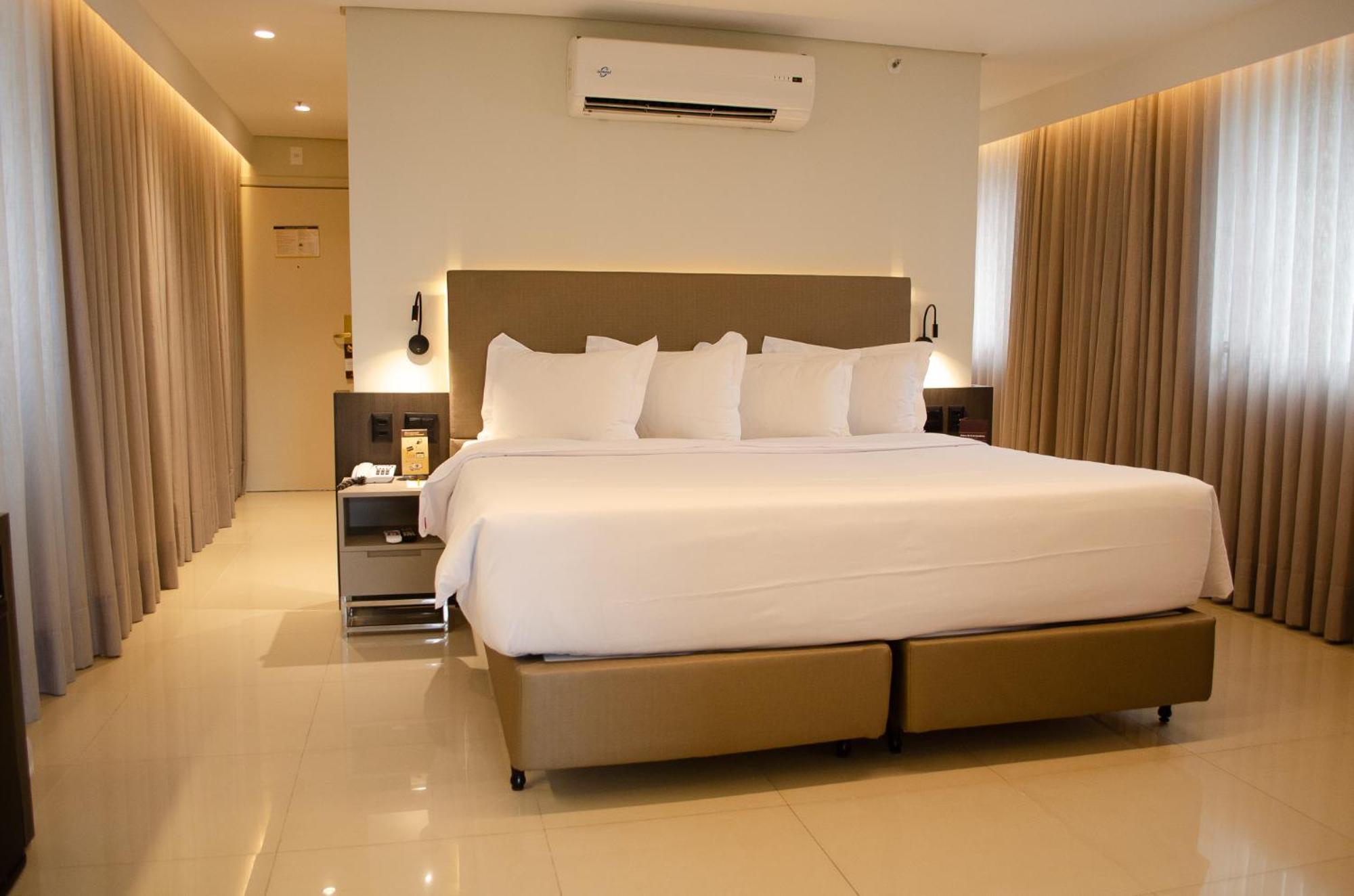 Royal Boutique Savassi Hotel Belo Horizonte Bagian luar foto A bedroom at the hotel